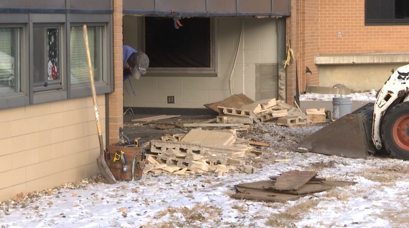 Authorities investigating an overnight car crash that damaged Lewis & Clark Elementary in Minot