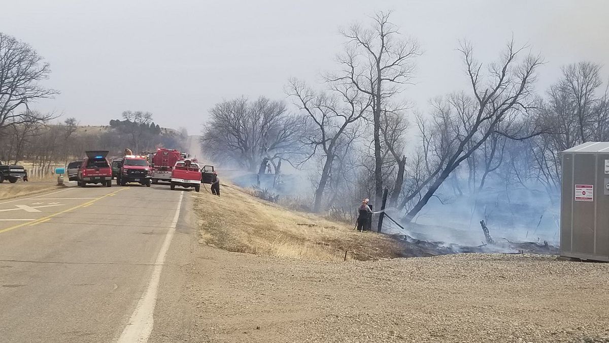 Crews battling grass fire near Logan