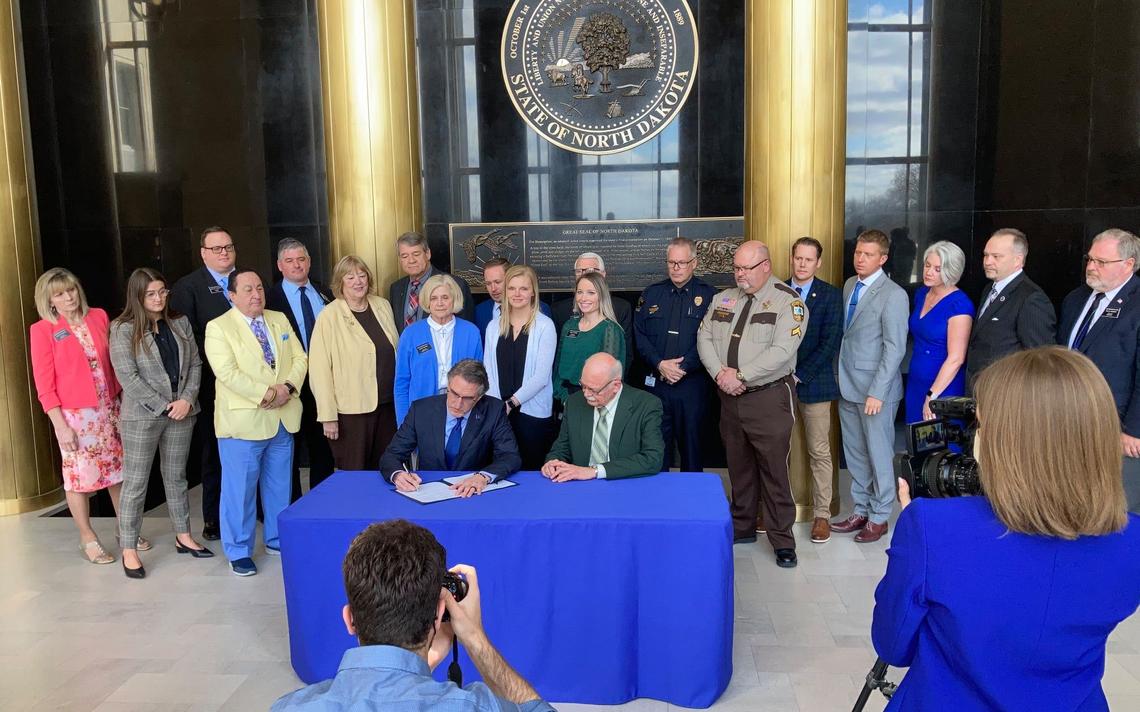 North Dakota lawmaker appears in photo-op for signing of bill that she voted against