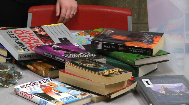 Minot State students collect books for Project Armchair