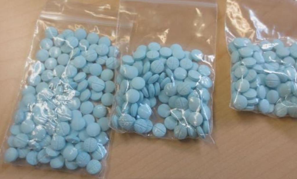 Investigators arrested a Detroit man they say was carrying more than 400 illegal pills intended for delivery to someone in Bismarck