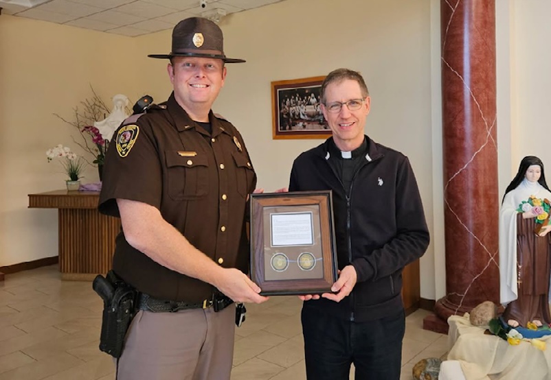 North Dakota Highway Patrol honors priest for 30 years as chaplain