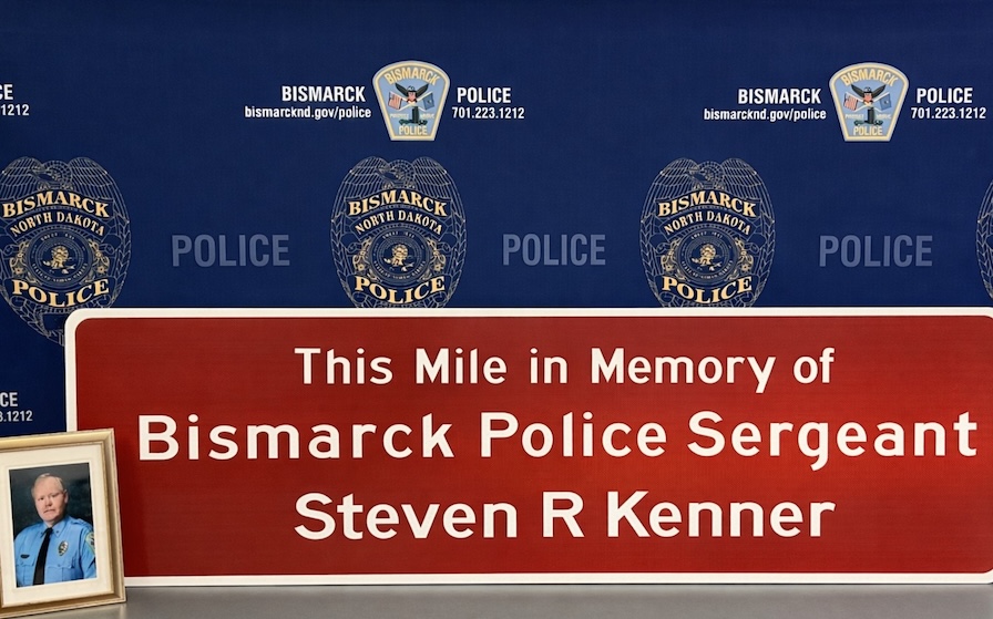 Bismarck honors fallen officer with highway memorial sign