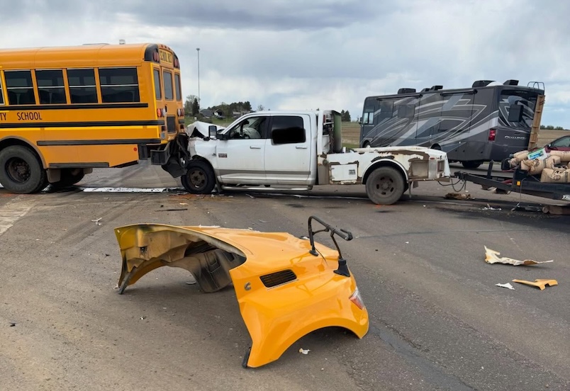 North Dakota Highway Patrol investigates after vehicle crashes into school bus, driver arrested for driving under the influence amid alleged distraction by cellular device