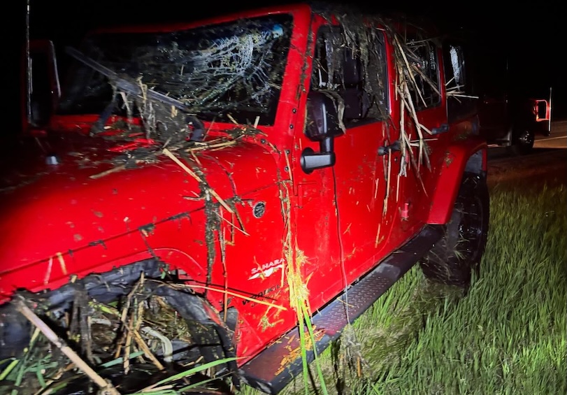 NDHP troopers report rollover crash ended with vehicle upside down in slough, driver was uninjured and accused of impaired driving