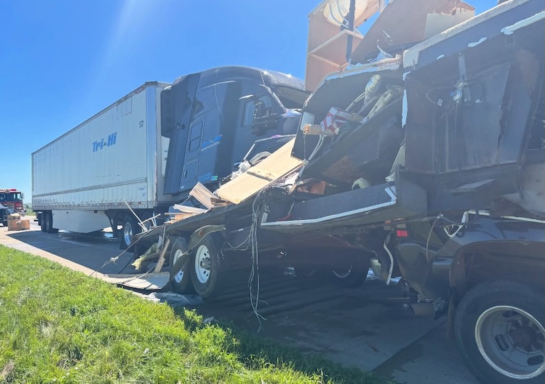 North Dakota Highway Patrol says driver rear-ended pickup pulling camper on I-94 after claiming he was distracted while eating