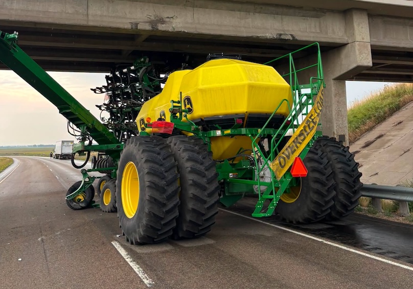 Farm equipment becomes stuck under I-94 overpass, forcing eastbound closure and causing traffic delays before lanes reopen