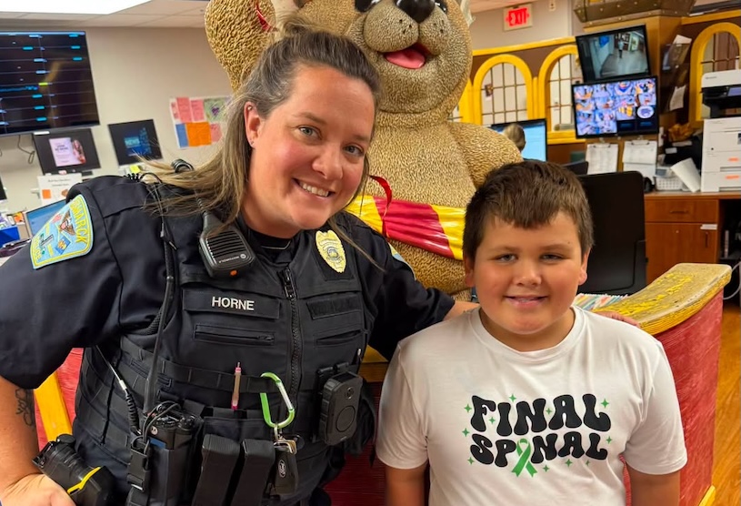 Bismarck police celebrate young cancer survivor after final spinal appointment following 800+ days of chemotherapy